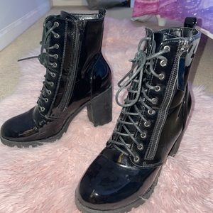 Warn once shiny pu leather laced up heeled boots . Perfect for casual and dressy